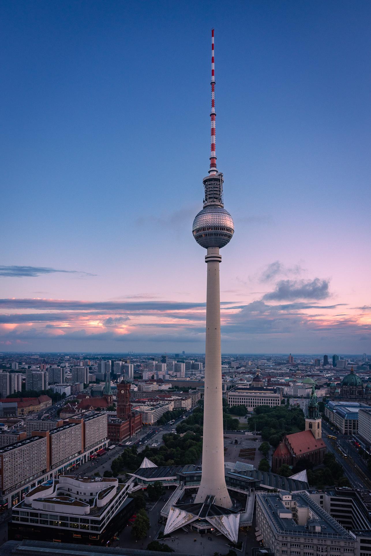 Berlin skyline at sunset with TV tower seen from a highrise building.